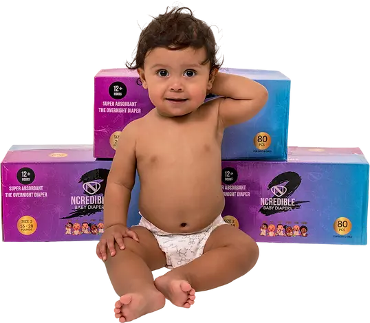 Baby sitting on Ncredible Diapers packs